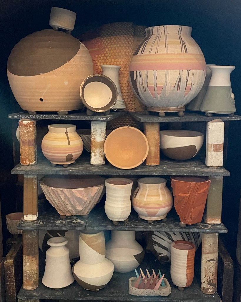 photo of a kiln before the pottery is fired.